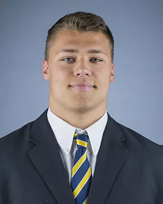 2016 Trevor Howard Coat And Tie Head Shot