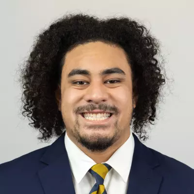 Elisha Faamatuainu headshot