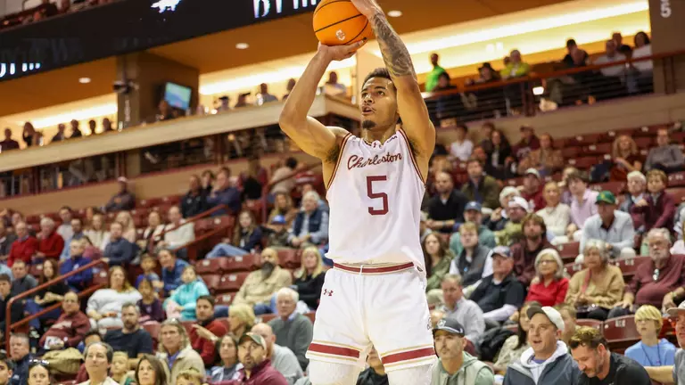 Martin Kalu shoots the basketball