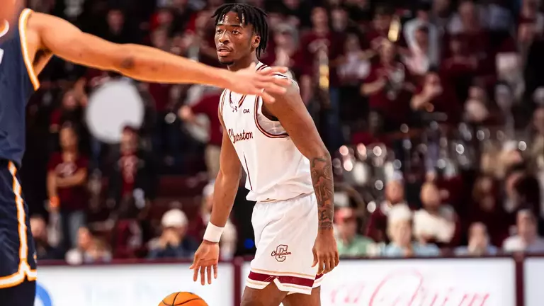 Chadlyn traylor dribbles the basketball
