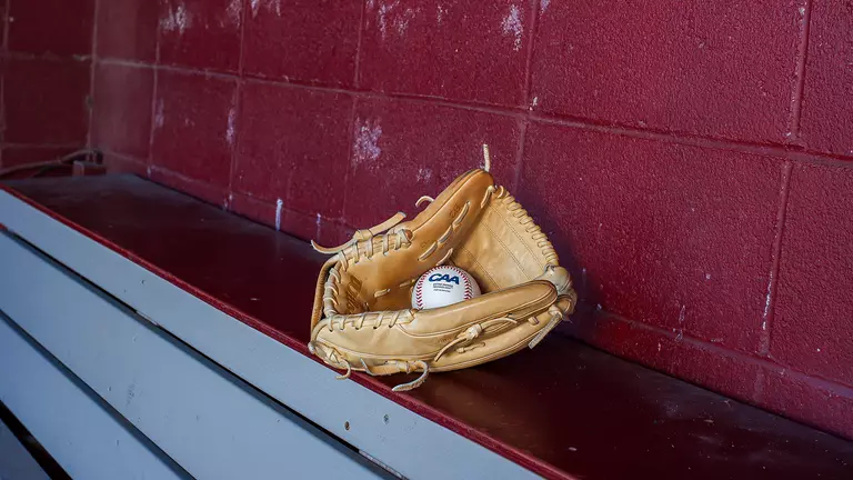 CAA baseball in a baseball glove