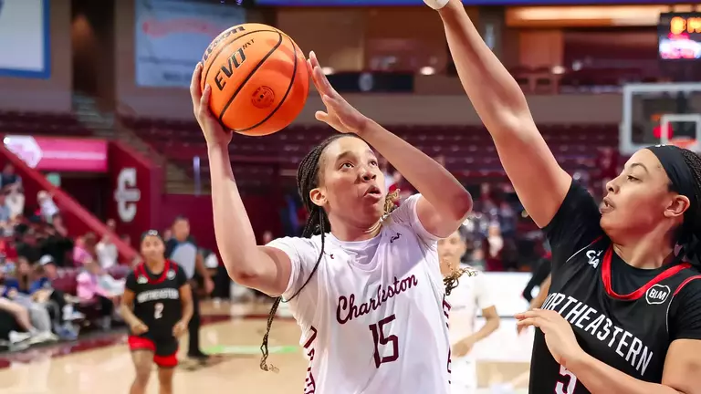 Tyja Beans shoots mid-range jumper against Northeastern