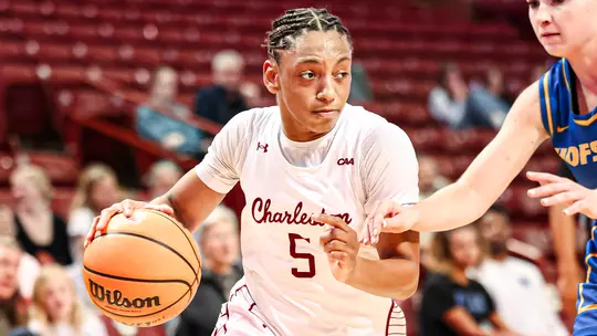 Taryn Barbot drives down the lane against Hofstra