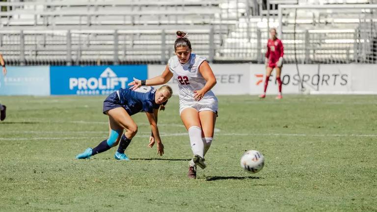 Sienna Petro kicking the ball