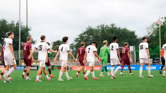 Men's Soccer walks onto the field