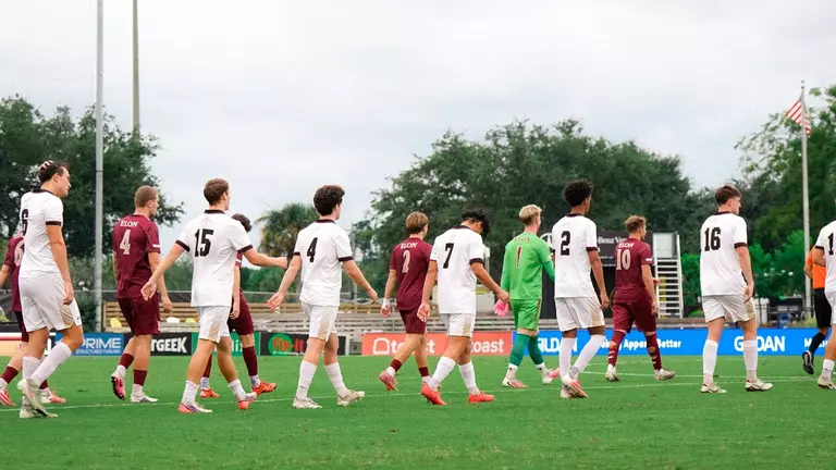 Men's Soccer walks onto the field