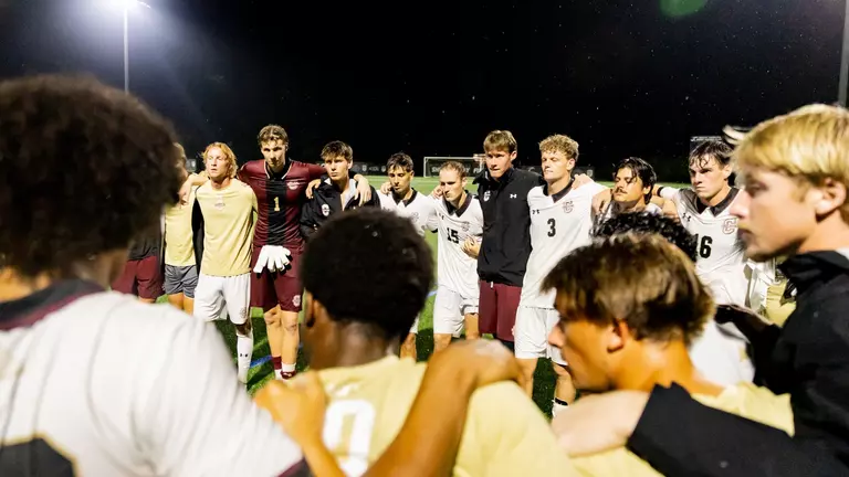 Men's Soccer Team Huddle