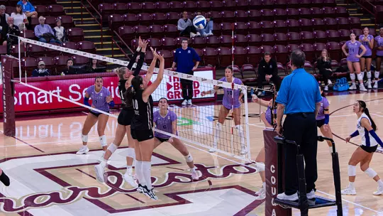 Makena Parthen and Helena Vukovic combining for a block.