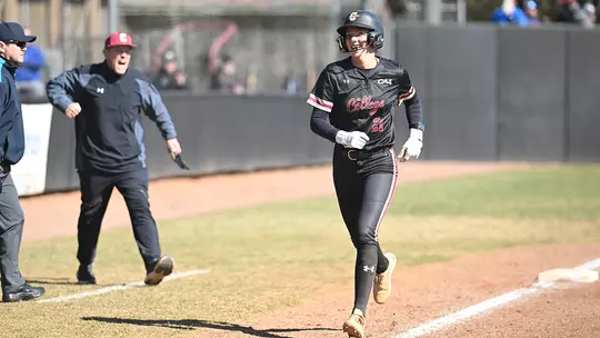 Leela Langston running from third to home