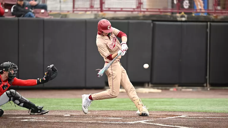 Nick Diaz swinging at a pitch.