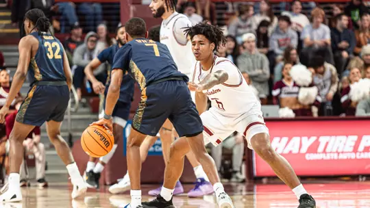 Chris Davis Jr. plays defense at the top of the key