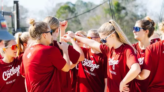 Beach Volleyball huddle at practice