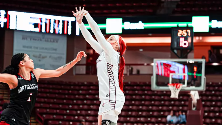 Jami Hill Shoots 3-pointer against Northeastern
