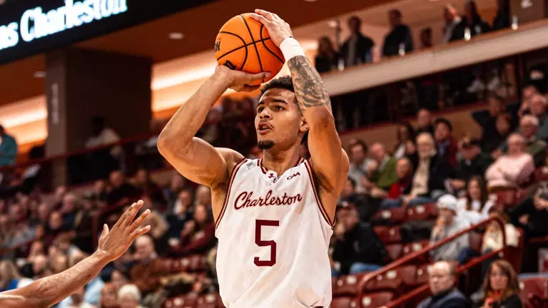 Martin Kalu shoots the basketball