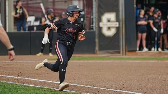 Austy Miller running to first base