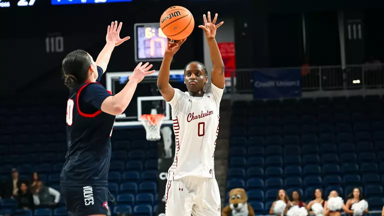 Taylor Barbot shoots three against Stony Brook