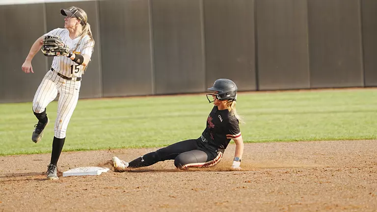 Bronwyn Conroy sliding into second base