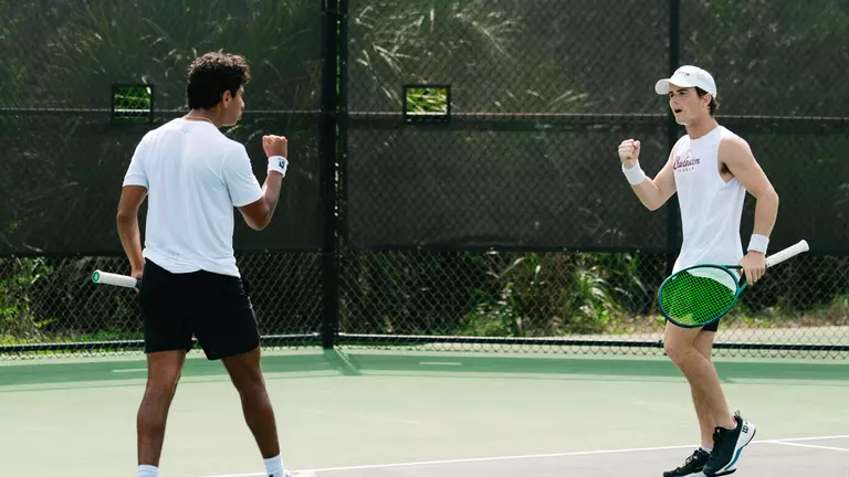 Ram Mude and Jake Smith celebrate point