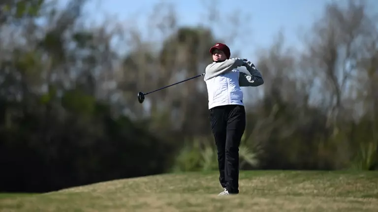 Molly Hardwick swings the club