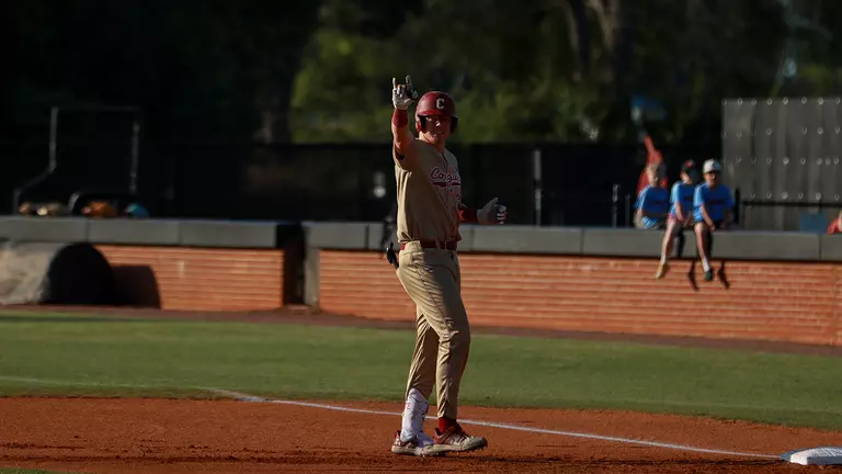 Alex LaCoste celebrating after a single March 31 at Winthrop.