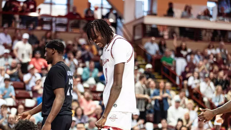 Chol Machot celebrates after a basket