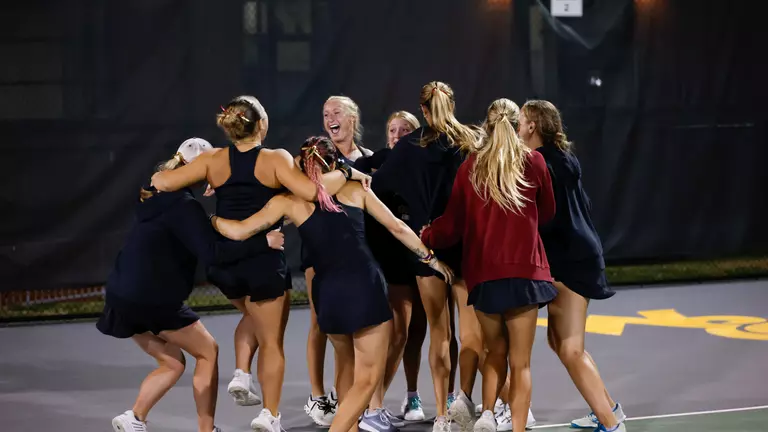 Women's tennis team celebrates win over Campbell