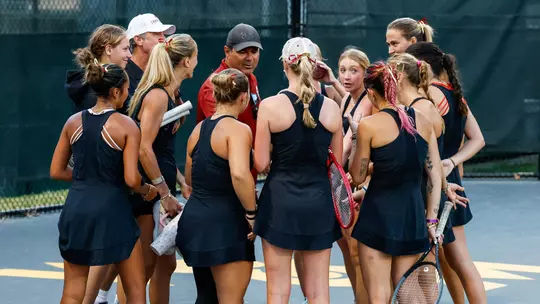 Women's tennis team huddle