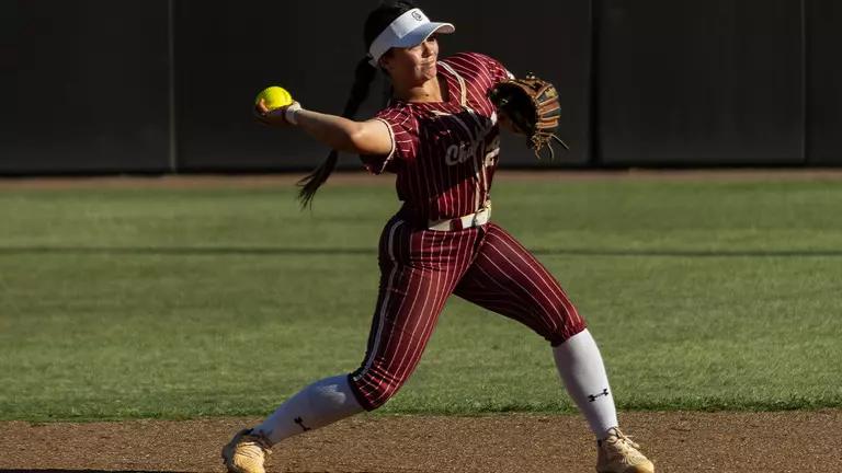 Karlee Hughes throwing the ball