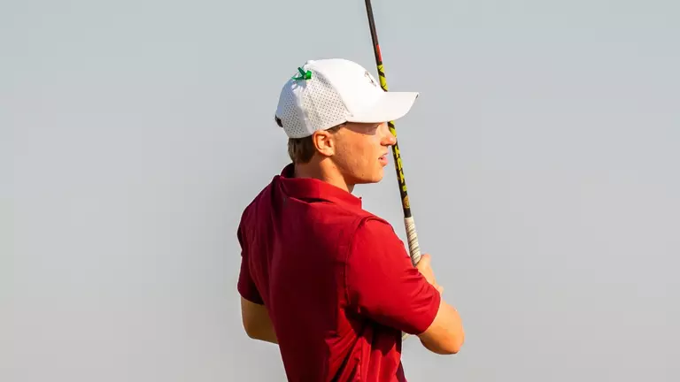 Jules Lauer finishes his swing