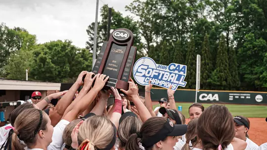 Team holding up the CAA Trophy