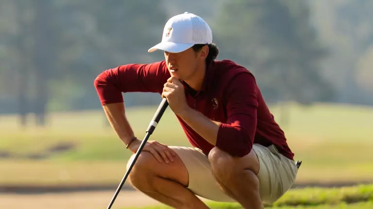 Loran Appel looks at the ball path