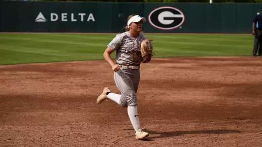Austy Miller runs in from the outfield