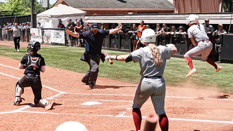 Bronwyn Conroy celebrating a run scored