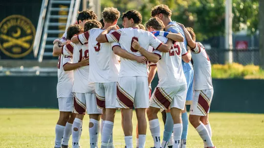 Men's Soccer Team Huddles Pregame