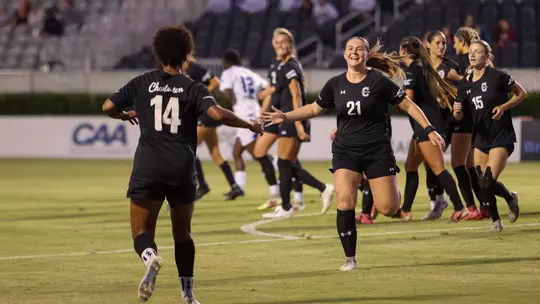 Antoni and Heffernan Celebrate after a goal to high five each other