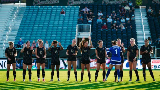 Women's Soccer starters lined up before the game
