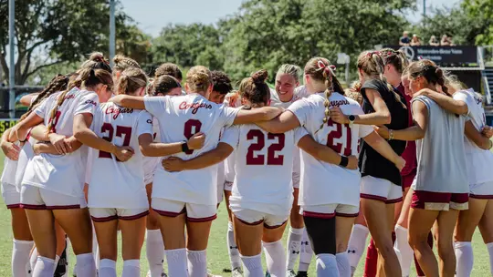 Women's Soccer team huddle