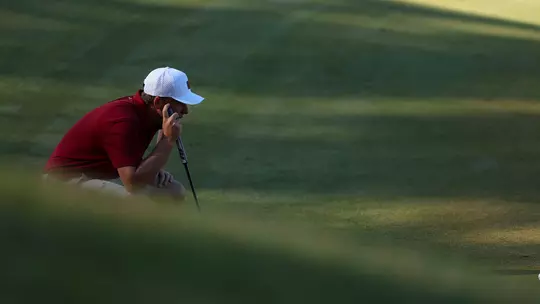 Roelof Craig looking at a putt behind the green.