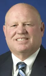 Fairchild names first two coaches