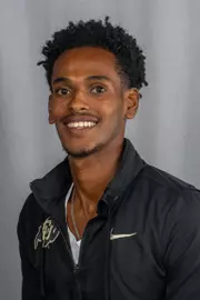 Kelati, Simon