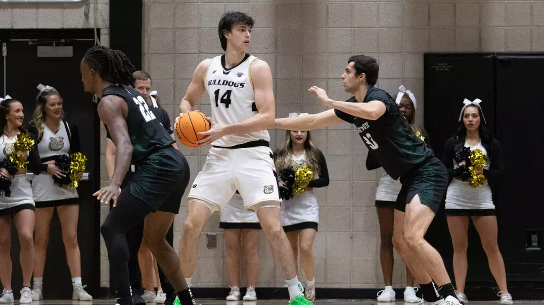 Jackson Munro plays against Bryant