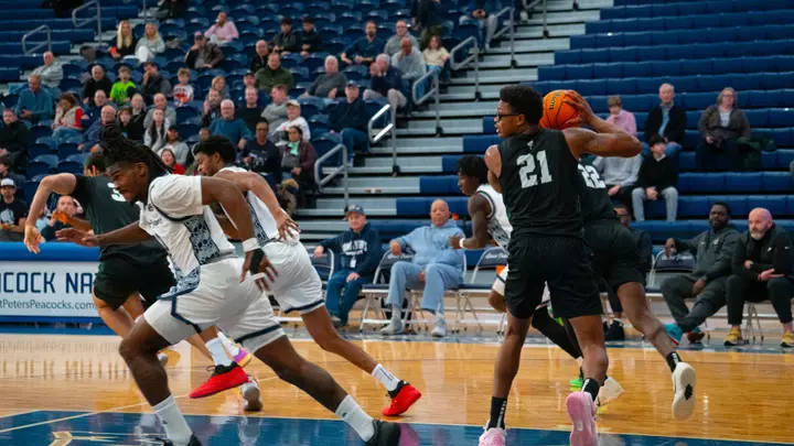 Brandon Mitchell-Day plays against St. Peter's