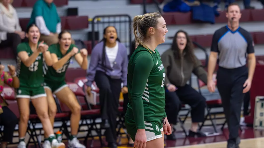 Olivia Austin Women's Basketball Team Bench Celebration