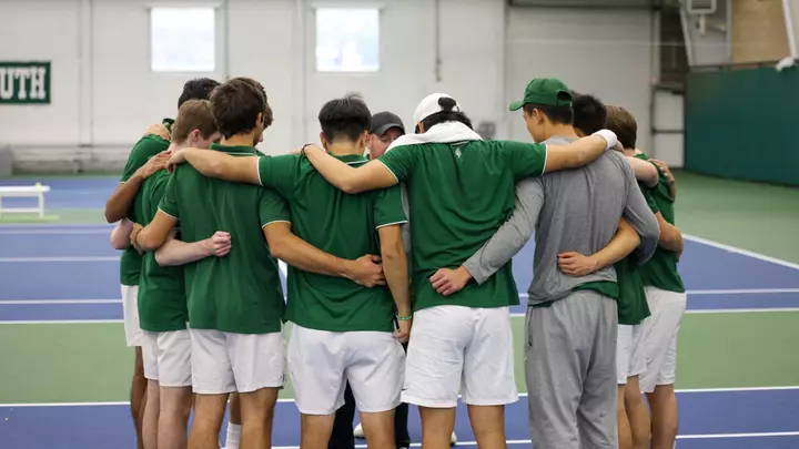 Men's tennis group huddle