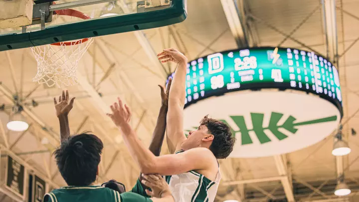 Anton Strelnikov hits a layup against Elms