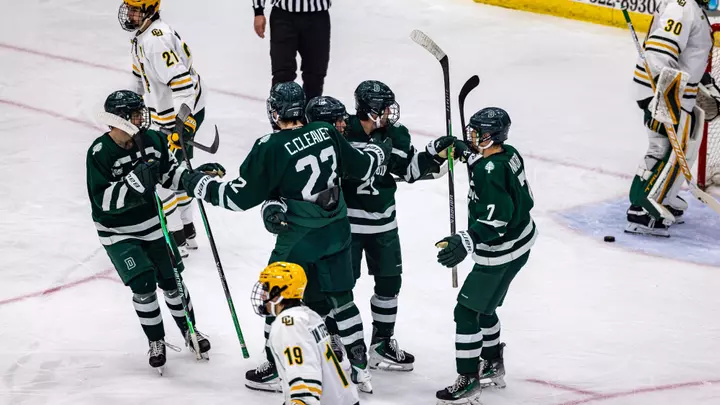 DMIH celebrates a goal vs Clarkson