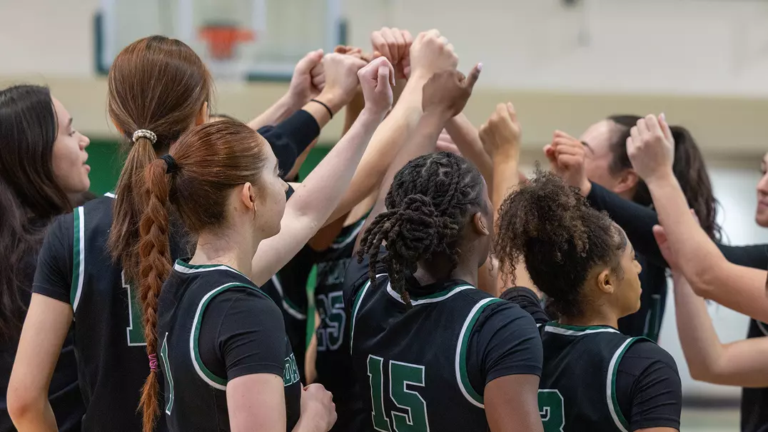 Women's Basketball Team Huddle