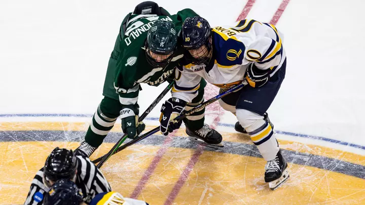 Cam MacDonald battles with a QPac player