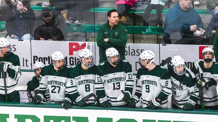 Reid Cashman behind the bench at Thompson Arena