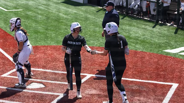 Softball high fives at the plate